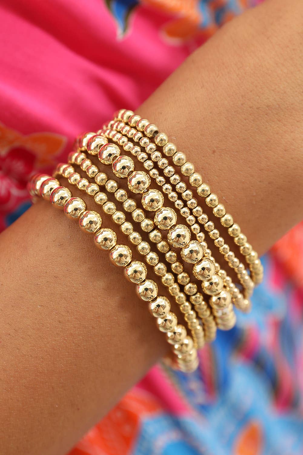 7 pc Beaded Gold stack bracelets