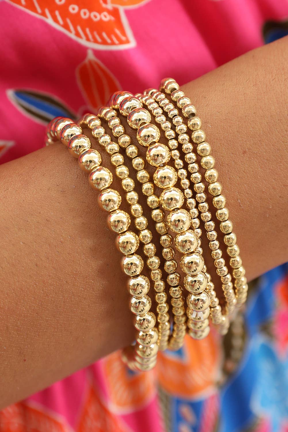 7 pc Beaded Gold stack bracelets