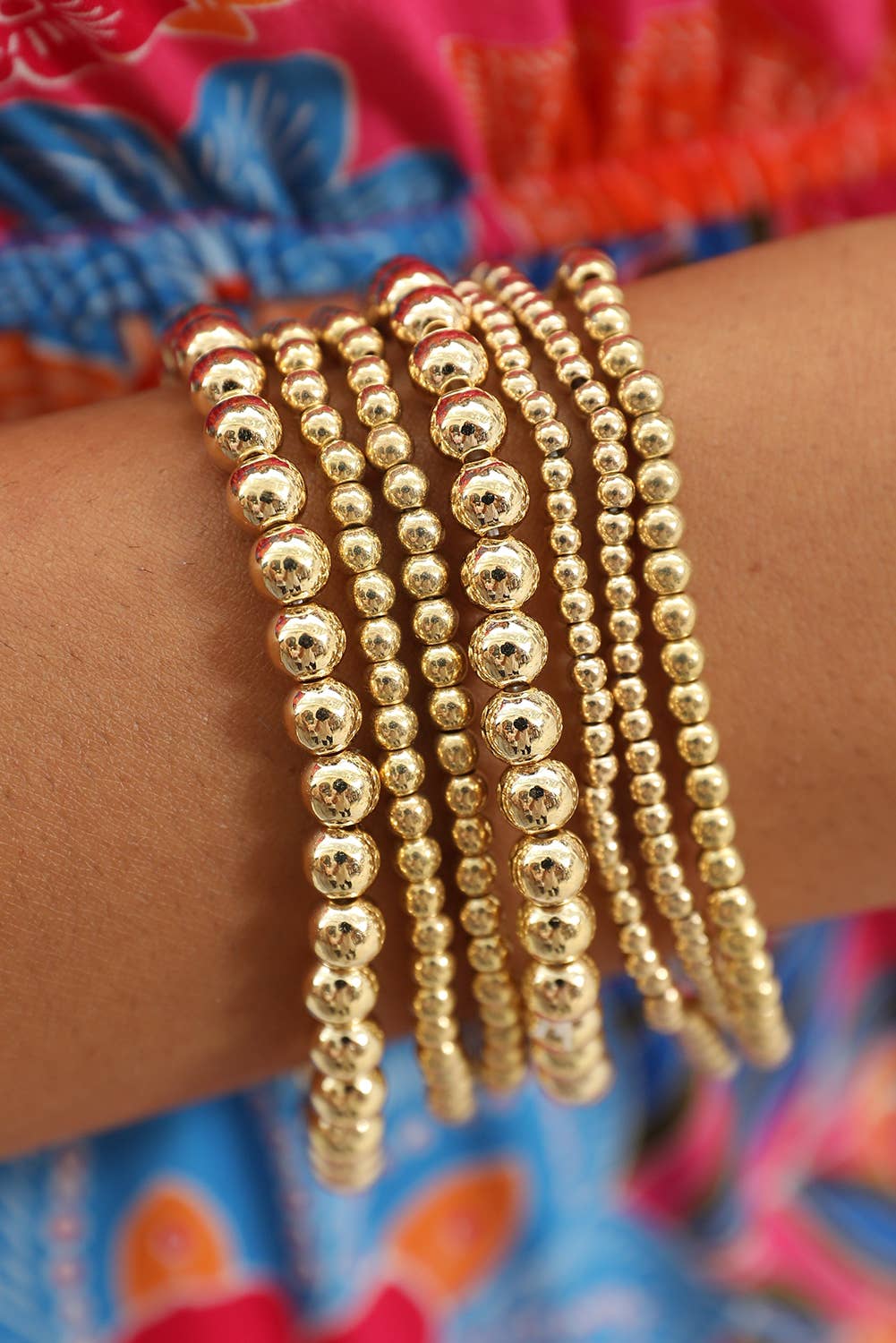 7 pc Beaded Gold stack bracelets