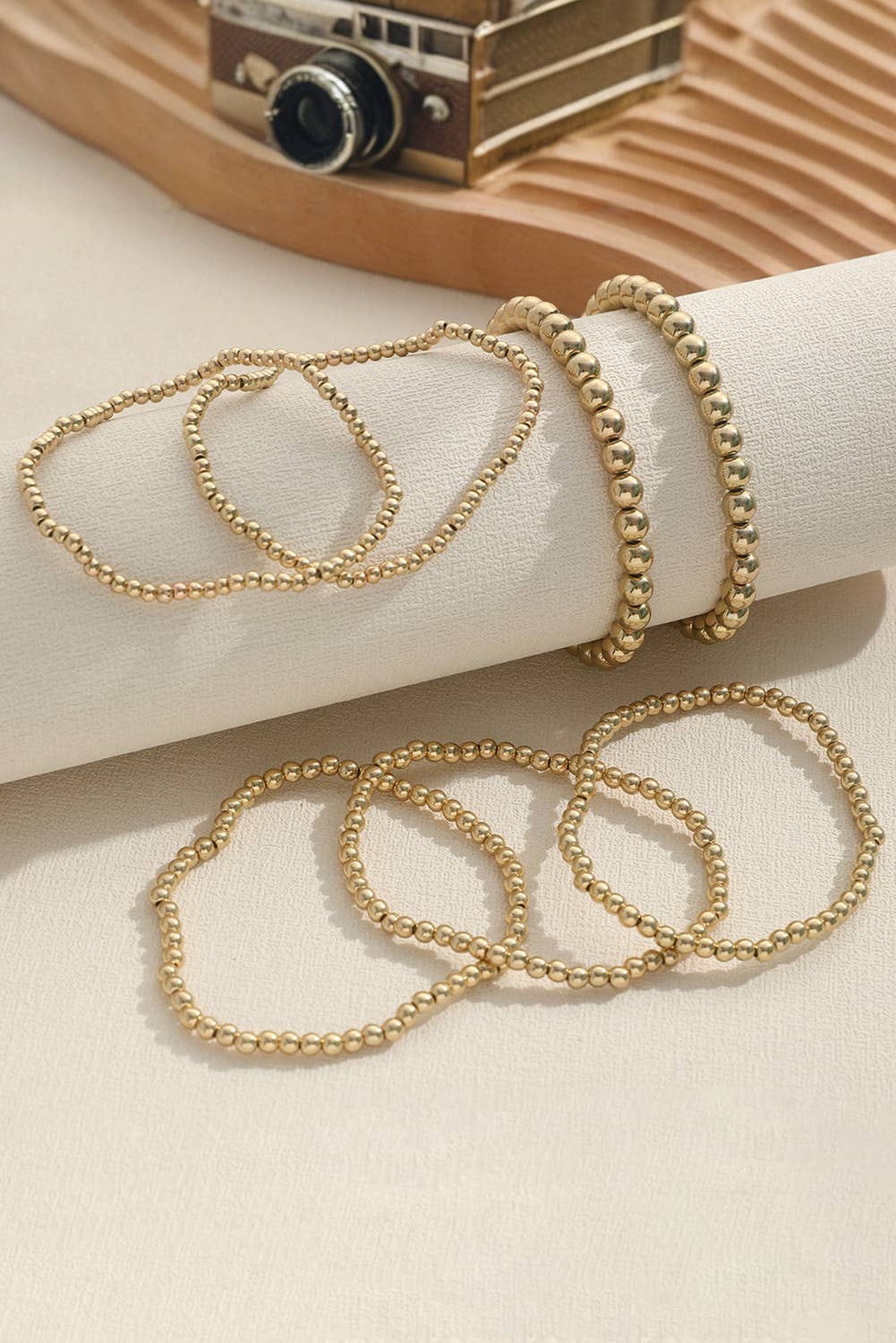 7 pc Beaded Gold stack bracelets