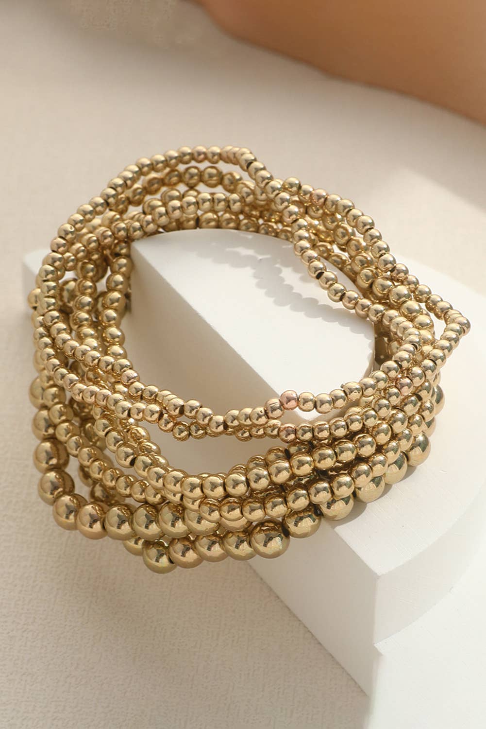 7 pc Beaded Gold stack bracelets